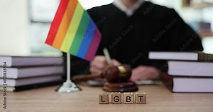LGBT rights and law and blocks with LGBT text in courtroom. LGBT rights in states of world