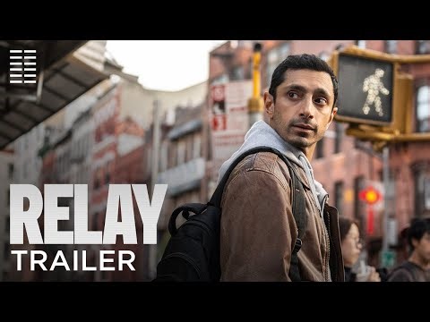 ‘Relay’ movie review: Riz Ahmed is the silky center of this throwback thriller