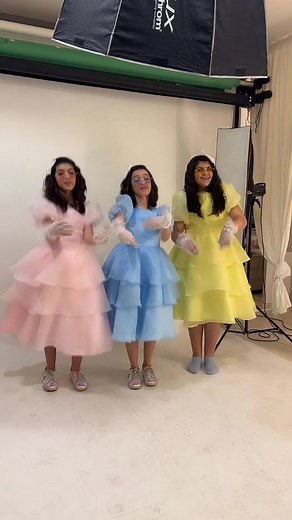 Colorful Dance Performance by Young Girls in Dresses