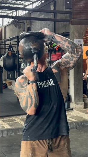 KB bottoms-up press — shoulder stability test