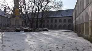 inner Yard and View of the Cistercian monastery Heiligenkreuz abbey with trinity column