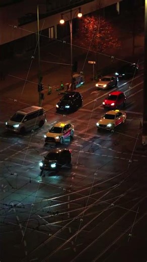 Night-time Traffic Flow in a Modern City, Captured from Above