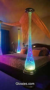 Bubbling lava lamp beds are amazing and fun! They have tall glass columns filled with colorful liquid that swirls and sparkles. The sparkles move gently inside, looking just like stars in outer space. When you lay down, you feel like you’re floating in a magical galaxy!These special beds can make your bedroom look incredible. The sparkling lights glow softly at night and help you fall asleep peacefully. Everyone who visits will say, “Wow!” because your room looks like a beautiful dream filled wi