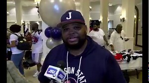 Rob Jay talks with Reed Enterprise CEO Thad Reed on how sales from his merchandise help raise money for JSU. | Jackson State Tigers
