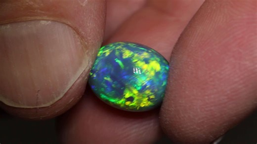 5.7K views · 204 reactions | ° Outstanding Black Opal ✔️ ° Magnificent High Dome ✔️ ° 3D Play of Color ✔️ ° Rolling Chaff Pattern ✔️ ° Script Pattern ✔️ ° Floral Pattern ✔️ 8.07ct black opal 13.6×10.4×9.2mm⁠ https://blackopaldirect.com/product/opal/black-opal/8-07-ct-black-opal-13-6x10-4x9-2mm/ | Black Opal Direct | Facebook