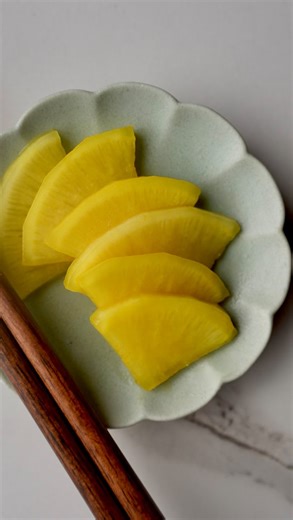 Kyrie | キリエ on Instagram: "TAKUAN Comment RECIPE for full recipe with recommended products/links or visit KyrieTheFoodie.com (link in bio) 🔗 Takuan is traditionally made by sun-drying and fermenting so this is a quick pickle method. Hope you guys enjoy!"