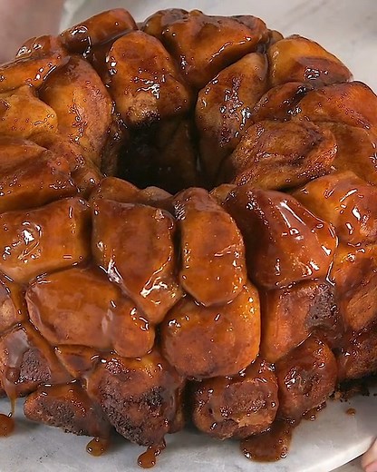 107K views · 109 reactions | Our Test Kitchen compared this pull-apart bread to cinnamon-sugar mini donuts covered in a caramel and chocolate glaze.  Get the recipe: https://trib.al/LjItlun | Southern Living | Facebook