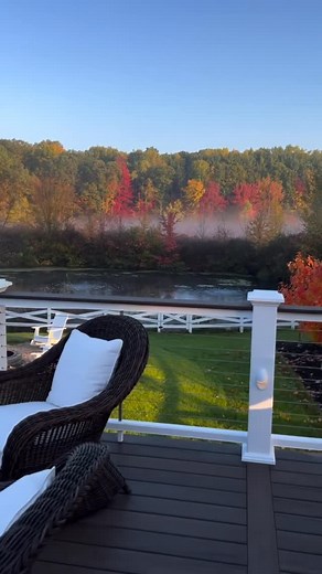 TimberTech on Instagram: "Surrounded by color, elevated by design. Perfectly paired decking and railing like @michelle_adams_ makes every fall view unforgettable.  Decking: Legacy Collection - Mocha Railing: Classic Composite Series - Drink Rail - Matte White"