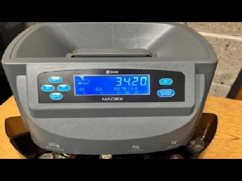 Nadex S540 Pro, Coin Counter, Sorter, and Wrapper Review, Coin rolling works great with most papers.