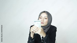 Focused business woman counting cash money. Close up of female hands counting Malaysia banknotes. Money cash calculation