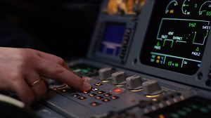 Panel of switches on an aircraft flight deck. Autopilot control element of an airliner. Pilot controls the aircraft. Onboard computer, cockpit