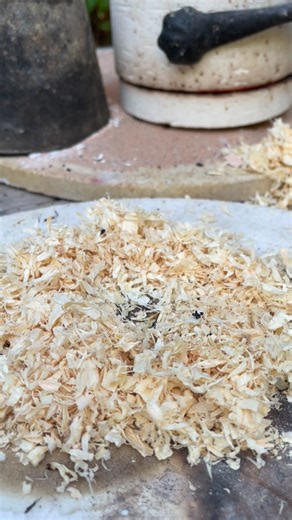 Rainbow Raku pottery, the stages of the glaze changing. Once the ceramic is glowing hot in the kiln it needs to move into reduction - that’s the flames - they eat the oxygen to burn and change the chemistry of the glaze. You can see it happen! Then when the bauble is re-exposed you can see it changing slowly still. If you freeze or rewind the final parts you will see the rainbows moving in the air. If I had left it in the tin longer it would be cooler so the change would be slower OR you can que