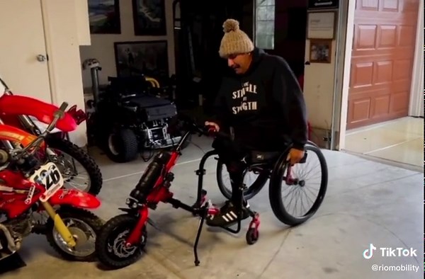 Transform your wheelchair into a futuristic ride with the Rio Mobility Fire Fly Wheel Chair Attachment! Say goodbye to manual pushing and hello to effortless, smooth mobility. With its compact and lightweight design, you can easily attach the Fire Fly to your wheelchair for on-the-go convenience. Experience the thrill of electric power as you glide through your daily routine with ease. The Fire Fly is equipped with a powerful motor and a rechargeable battery, ensuring you can go the distance.#Ri