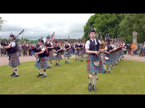 Strathisla Pipe Band playing Liberton Polka on the march during 2024 Gordon Castle Highland Games
