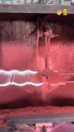Automatic process of spraying sand paint resin tiles