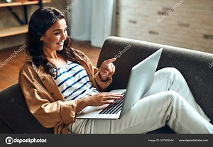 Woman Sitting Couch Laptop Living Room Home Video Conference Work