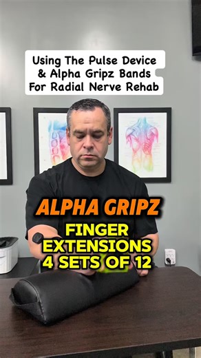 Chad Guerrero OT,COMT,CPT,SMT,Dip.OMT,SCC,PES,CES on Instagram: "Radial Nerve Rehab – My Ortho OT Approach Here I’m using the Pulse Device combined with Alpha Gripz extension bands to support radial nerve rehabilitation. The vibration stimulus can help modulate pain and improve neuromuscular input, while controlled finger and wrist extension work targets the extensor mass commonly involved with radial nerve irritation. Together, this pairing helps reinforce graded loading, motor control, and fun