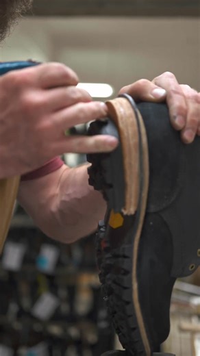 "Heeling" is an individual process that involves careful alignment of the leather stack with the cap, and several well-placed nails to keep the industrial-level materials in place. | JK Boots