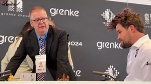 Video: Chess legend takes selfie with opponent before reporting her