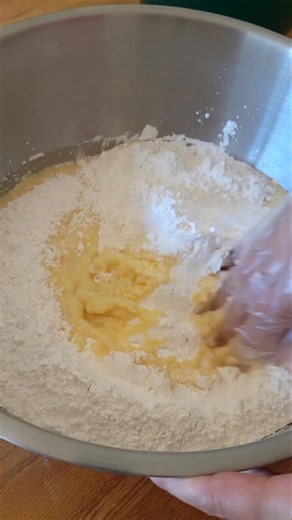 #fblifestyle #bakedgoods Bake Hmong Corn Bread (15-20 servings) - Approximately 30 fresh corns, grated to yield 10 cups - 2 packs Glutinous rice flour (16oz each) - 2 cups rice flour - 1/2 cup sugar (optional less or more to your taste) - 1/2 tablespoon melted Unsalted Butter to grease the baking tray. - 1 non-stick cookie baking sheet/tray, size 15×21×1 for baking the corn bread. Direction: All ingredients in a large bowl and mix well. Melt Unsalted Butter in microwave for 30 seconds to grease 