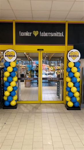 Ballonim® Ballonshop Butzbach on Instagram: "100 Jahre EDEKA – Deko, die genauso lange hält? 😉 ​Okay, vielleicht keine 100 Jahre, aber unsere Ballno-Säulen halten definitiv länger als jeder Luftballon! 🎈🚫 Für das Jubiläum von EDEKA Lemler durften wir den Eingangsbereich strahlen lassen. ​✨ Perfektes Branding: EDEKA-Blau & Gelb. ✨ Edler Look: Hochwertig und stabil im Kundenstrom. ✨ Nachhaltig: Kein Müll nach der Feier. ​So feiert man heute! 🎉 Wie gefällt euch die Farbkombi? ​#edeka #ladeneinr
