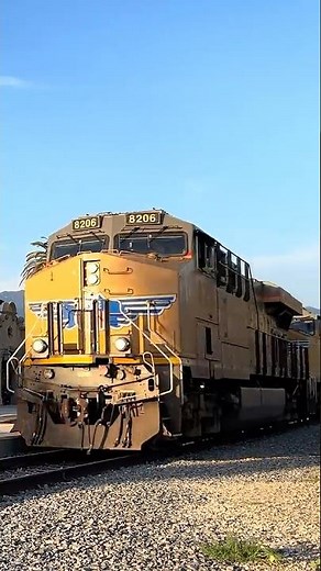 Union Pacific freight train cruising through Santa Barbara with 2 SD70M’s and a friendly crew