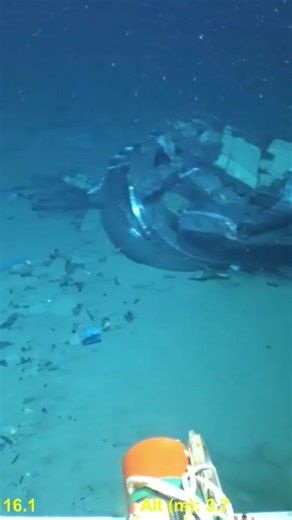 The US Coast Guard released video footage showing debris from OceanGate's Titan submersible on the ocean floor. The Marine Board of Investigation located the imploded vessel just several hundred yards from the Titanic shipwreck. All five people on board the vessel were killed last June after a catastrophic implosion. #cnn