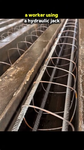 A hydraulic jack to apply tension to steel tendons during the production of prestressed concrete