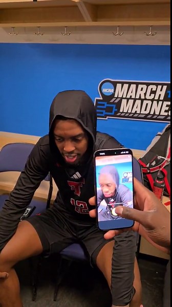 Marial Akuentok has fun with Texas Tech teammate Donovan Atwell