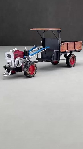 The retro nostalgic tractor toy is here, with a built-in crank handle! It's very fun to shake it