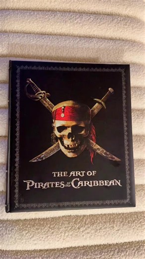 The Art of Pirates of the Caribbean book! So much beautiful artwork. This book covers the first 3 films. 🖤 #piratesofthecaribbean #jacksparrow #willturner #elizabethswann #johnnydepp #orlandobloom #keiraknightley #davyjones #curseoftheblackpearl #deadmanschest #atworldsend #potc #fyp #moviebook #disney #pirates