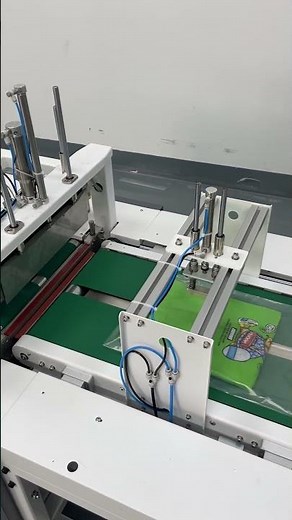 Automatic clothes folding & packing machine