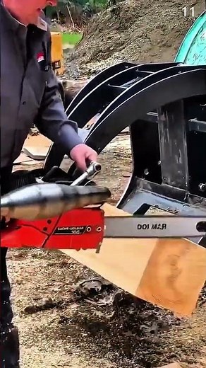 Cutting wood using red Sachs Dolmar chainsaw