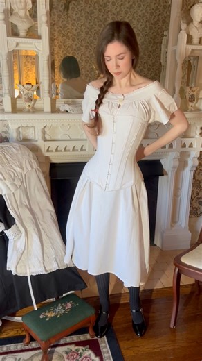 Before we start: Would she have a fancy fireplace? No. Could I find a cold dreary attic to film in? Also no. So fancy fireplace it is. How many layers did you count?? Funny this should come up in my memories because I CANNOT FIND THIS SKIRT ANYWHERE. Everyone is always asking to see what everyday women wore so I decided to show you what a housemaid in 1890 would have worn. ➡️ It was my first time sewing huge sleeves, what do you think about them? Heels by @memeryshoes Costume by @asta.darling Re