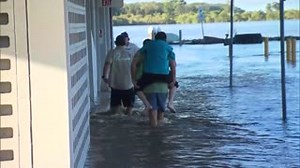 17K views · 296 reactions | COMMUNITY SPIRIT: Members of the Ballina community carry aged care workers on their backs into the Ballina RSL, where residents have been evacuated to for their safety. #9Today | TODAY | Facebook
