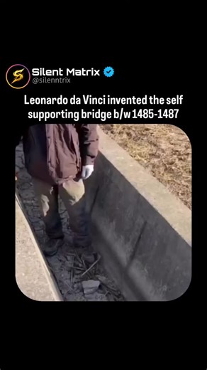 Business | Wealth | Inspiration on Instagram: "This 15-second reel showcases Leonardo da Vinci’s self-supporting bridge concept (1485–1487) — a structure held together purely by mechanics, not nails or fasteners. Wooden beams interlock so each transfers its load to the next through direct contact, forming a stable system governed by static equilibrium. From a physics standpoint, vertical loads convert into compressive forces along the beams. Gravity increases the normal force at contact points, 