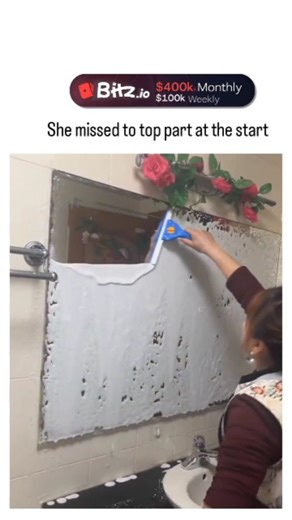 PixelMind_25 on Instagram: "This X post shares a 15-second video of a woman applying foamy cleaner to a bathroom mirror and wiping it clean with a squeegee for a flawless finish, captioned with mild frustration over an initially missed top section, tapping into the ASMR appeal of transformation content. Uploaded by @pmcafrica , a South African creator known for viral cleaning and life-hack clips, it exploded to 4.7 million views and 675 likes within hours on December 15, 2025, underscoring the p