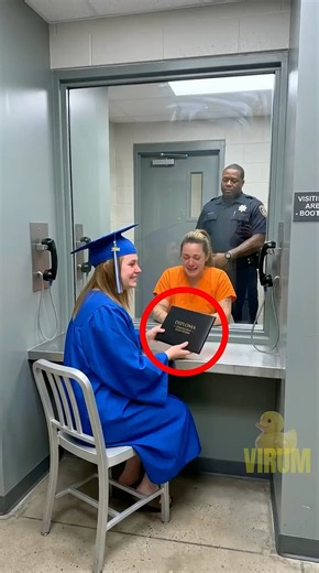 Guard Opens The Door So A Mother Can Hold Her Graduate