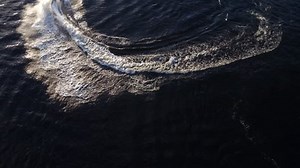 Drone aerial view of jet ski in a lake