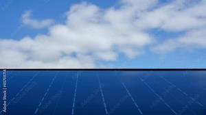 Solar electric battery time-lapse on the background of the sky. Solar panel looped footage
