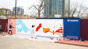 On Day 1 of the Dropbox Live Mural at SXSW, artists Shawna X Hello and Rachell Sumpter brought the theme, Reimagining the Future, to life. While they each had their own visions of how to portray the future, they collaborated to create one cohesive work of art. | Dropbox