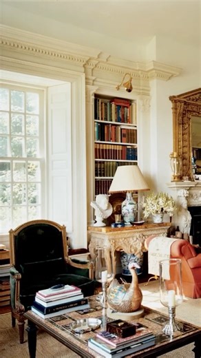 Newport Lamp & Shade Company on Instagram: "Lighting Stories, Episode One ✨ . We’re kicking off our new series with a favorite: Oscar and Annette de la Renta’s Connecticut home, originally featured in Vogue, December 2008 and photographed by François Halard. With a little help from AI, we’ve reimagined this beloved room at night to start a conversation about what makes layered lighting so successful—no harsh overheads, just pools of warmth from lamps, picture lights, and soft reflections that ma