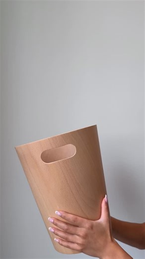 Leaning tower of Woodrow? Sounds about right. Meet Woodrow, the wooden trash can you won’t want to hide. | Umbra
