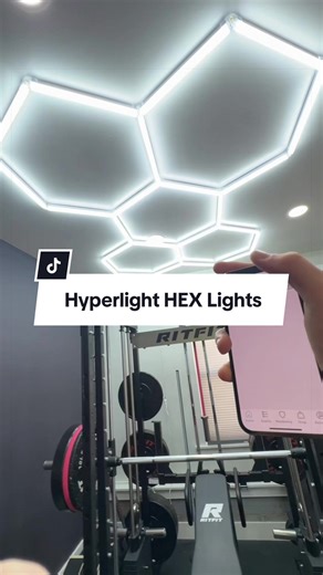 Hyperlight hexagon LED lights are a game changer for any home gym/ garage setup 🔥 turn your gym into a crazy studio with these lights #ledlights #hyperlight #gymtok #homegym