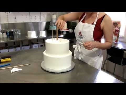 Stacking a four tiered cake