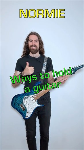 How to hold a guitar (The wrong way)
