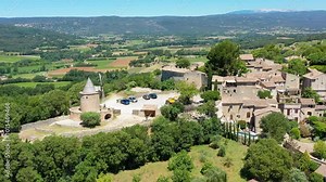 View of Goult, a small typical town in Provence, France. Discover the stunning hilltop village of Goult in Provence on a sunny day. Ancient hilltop village of Goult, Provence, France.