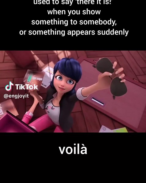 Understanding the French Word 'Voilà' in English