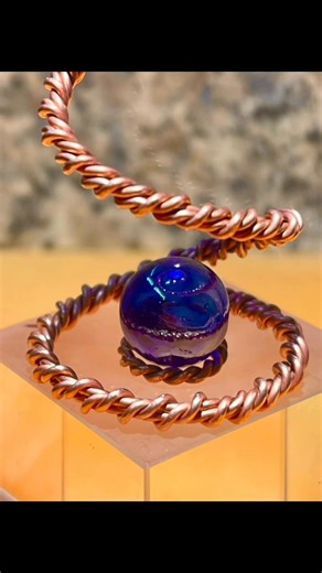 Copper spiral wire, tensor 1.5, length 60 cm, folded in half, spiraled 2 times, vertical coil spring form. #design #relaxation #positivevibes #EnergyBoost #astronomy #positiveenergy #relaxing | MineStone OnEarth