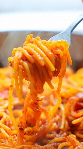 Spaghetti all’Assassina, or “Assassin’s Spaghetti” shows that sometimes it pays to break the rules! This Southern Italian favorite cooks the spaghetti right in a spicy tomato sauce until it’s crispy, singed, and totally irresistible. | The Mediterranean Dish